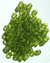 100 4x6mm Crow Beads Transparent Olive